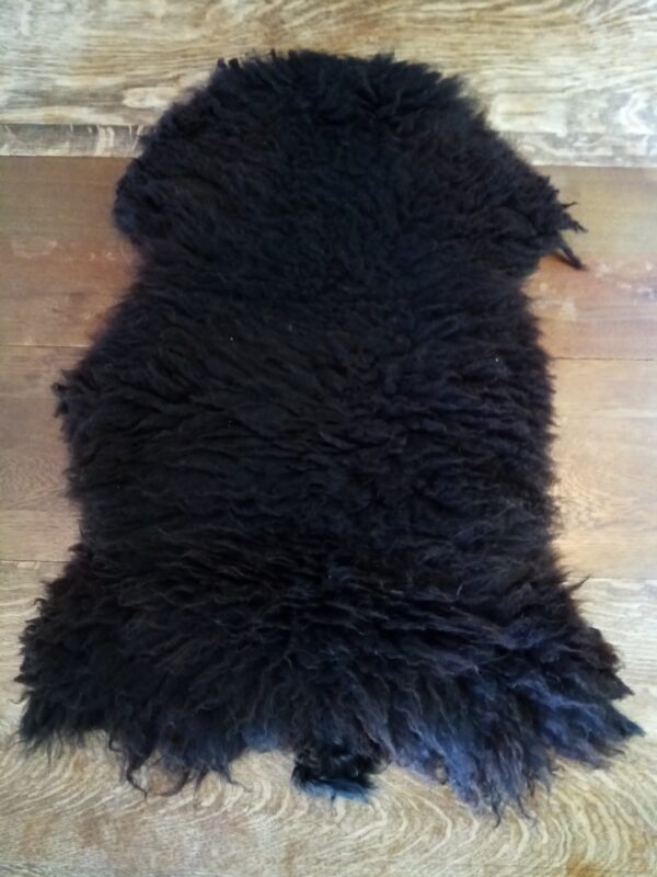 Dark brown lambskin, 32” x 23"